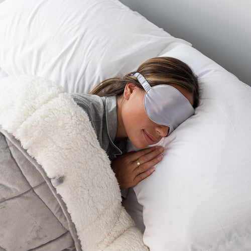 woman sleeping with eye mask