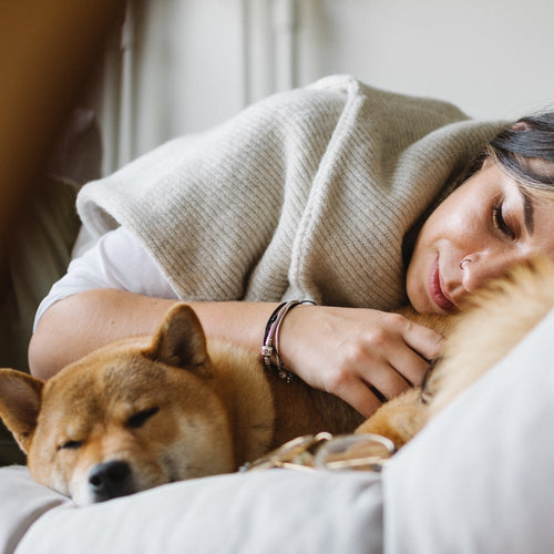 woman and dog sleeping